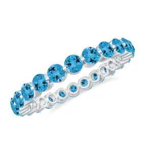 Eternity Band Ring with 2.25 CT Swiss Blue Topaz