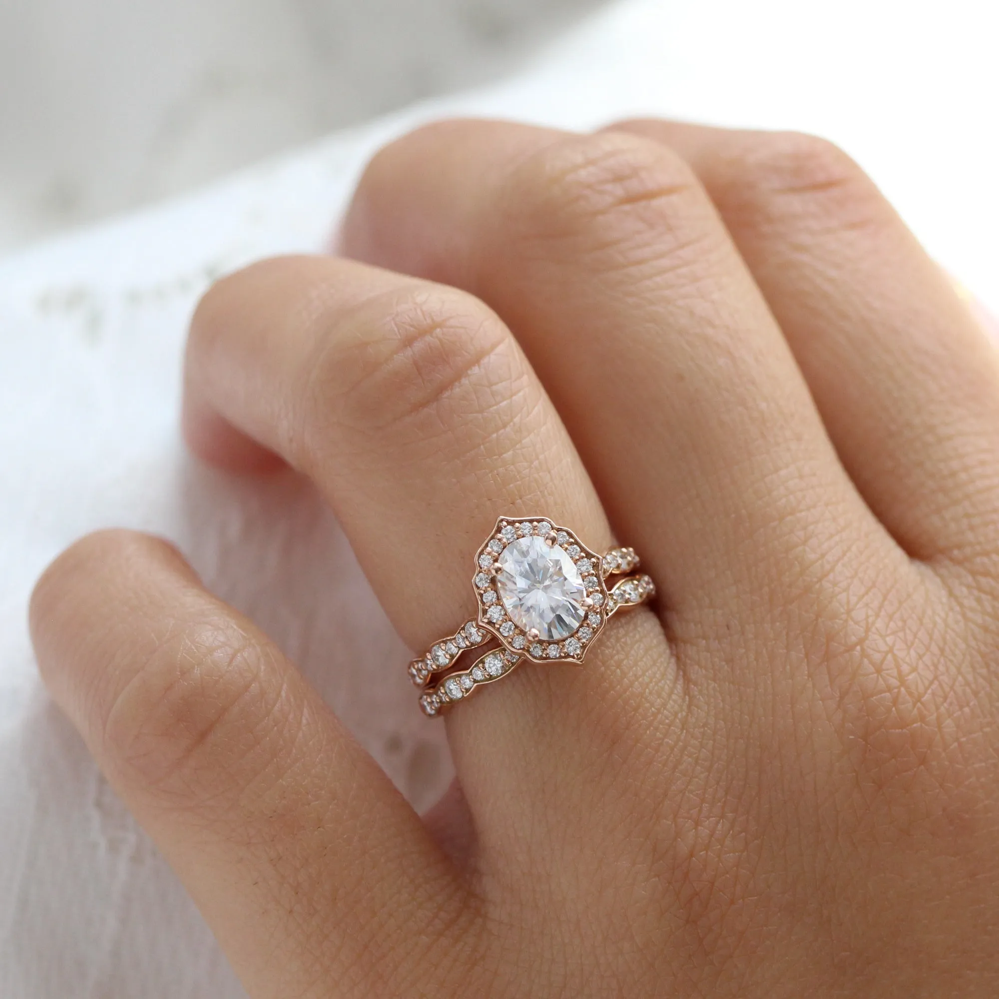 Oval Moissanite Engagement Ring in Vintage Floral Diamond Band