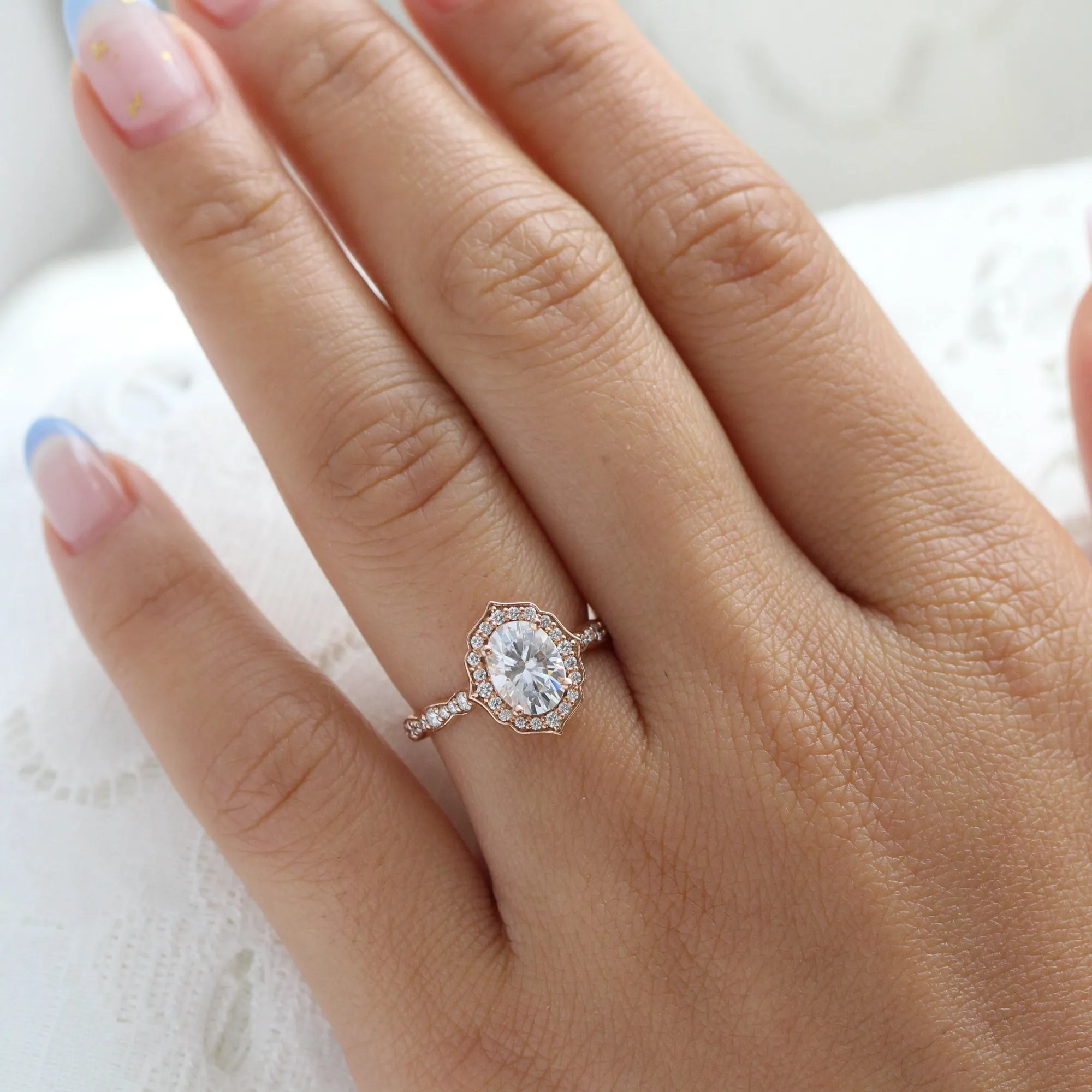 Oval Moissanite Engagement Ring in Vintage Floral Diamond Band